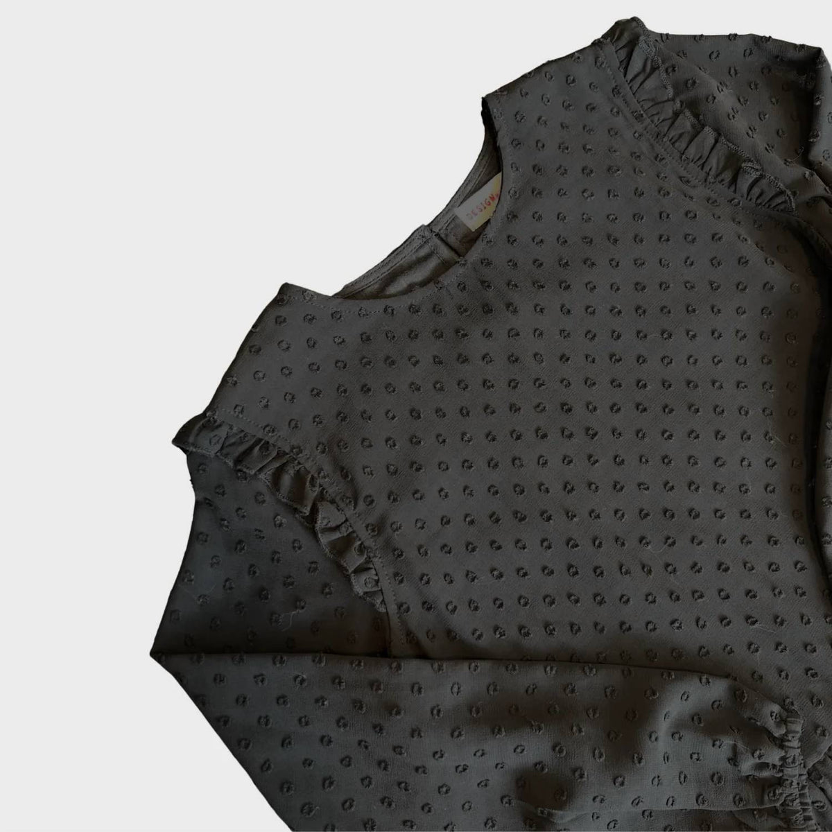 Women's 3D Dot Ruffled Bottom Top In Black